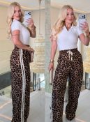 calça núbia estampada onça 2561